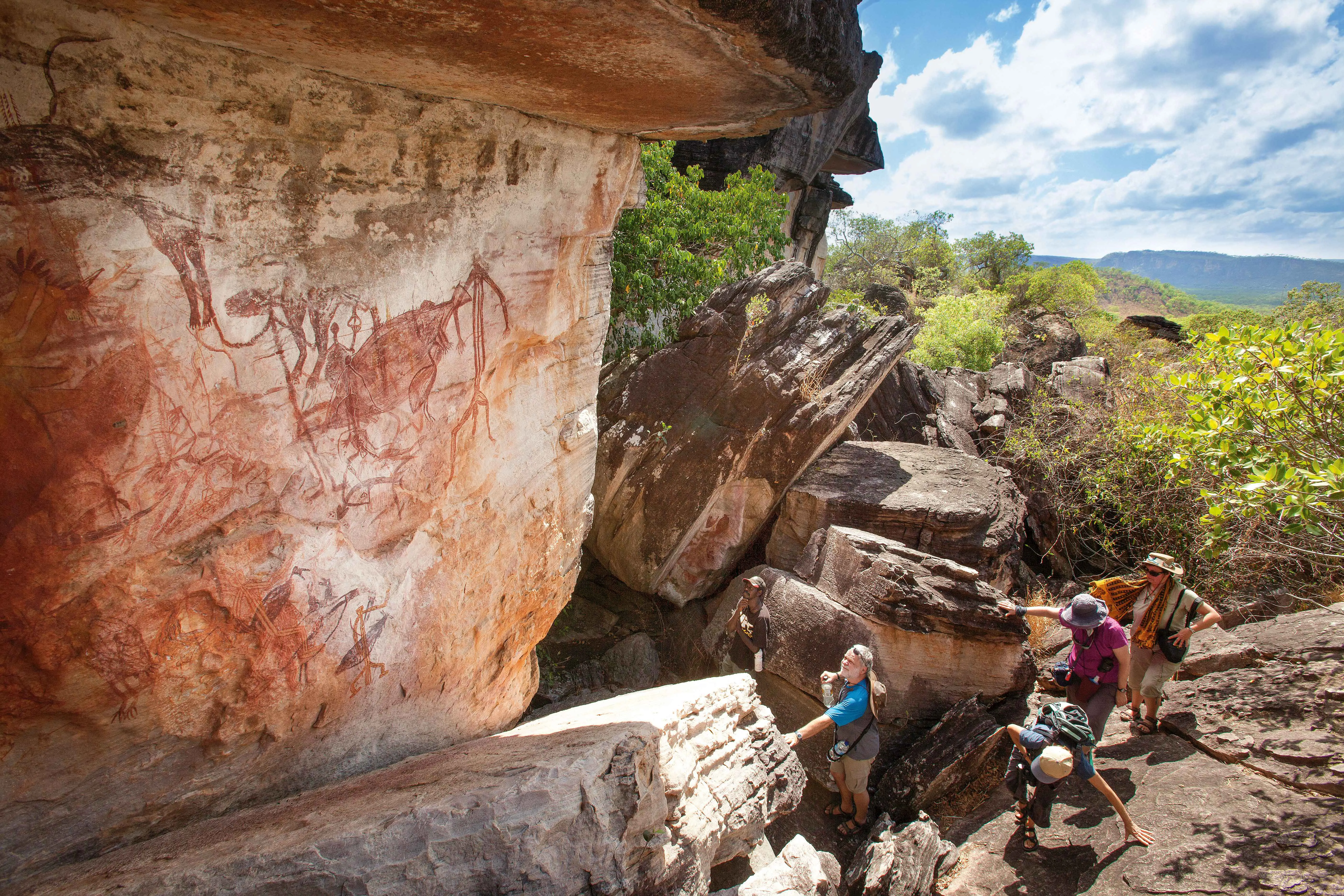 Guests viewing rock art in Kakadu National Park.