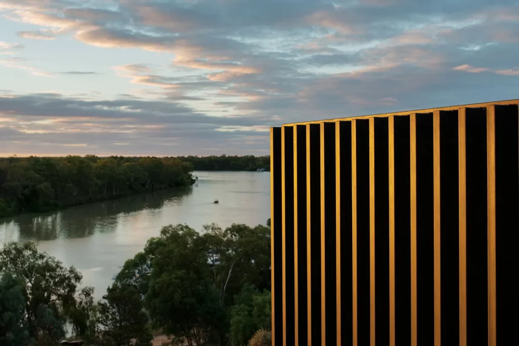 Exterior of The Frames overlooking the River Murray at dusk.