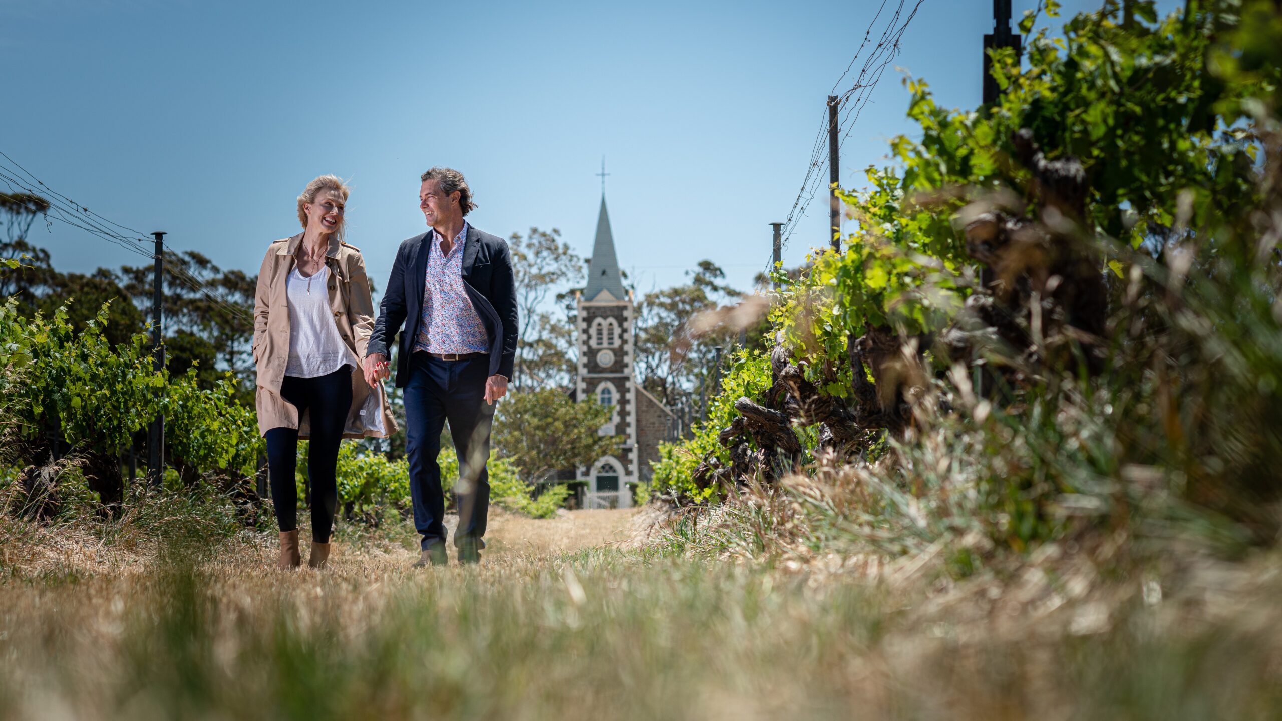 Guests walking through the vineyards of Henschke