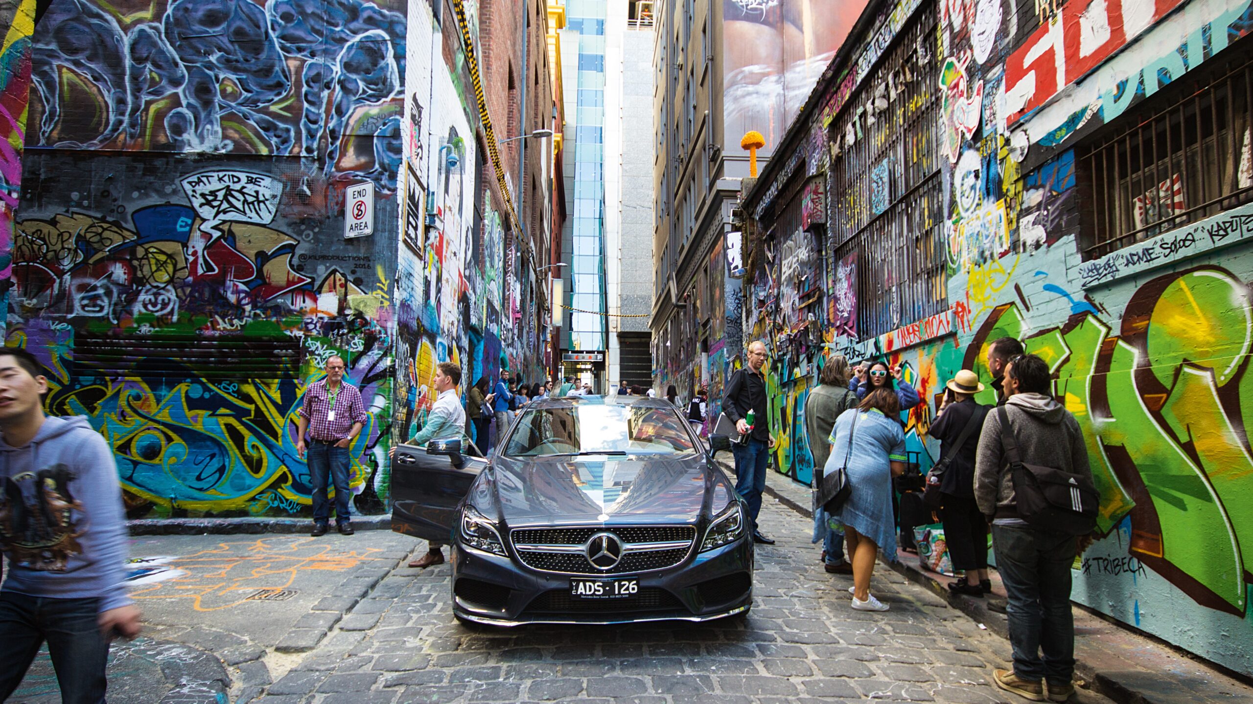Mercedes vehicle parked in Hosier Lane in Melbourne, a renowned spot for street art