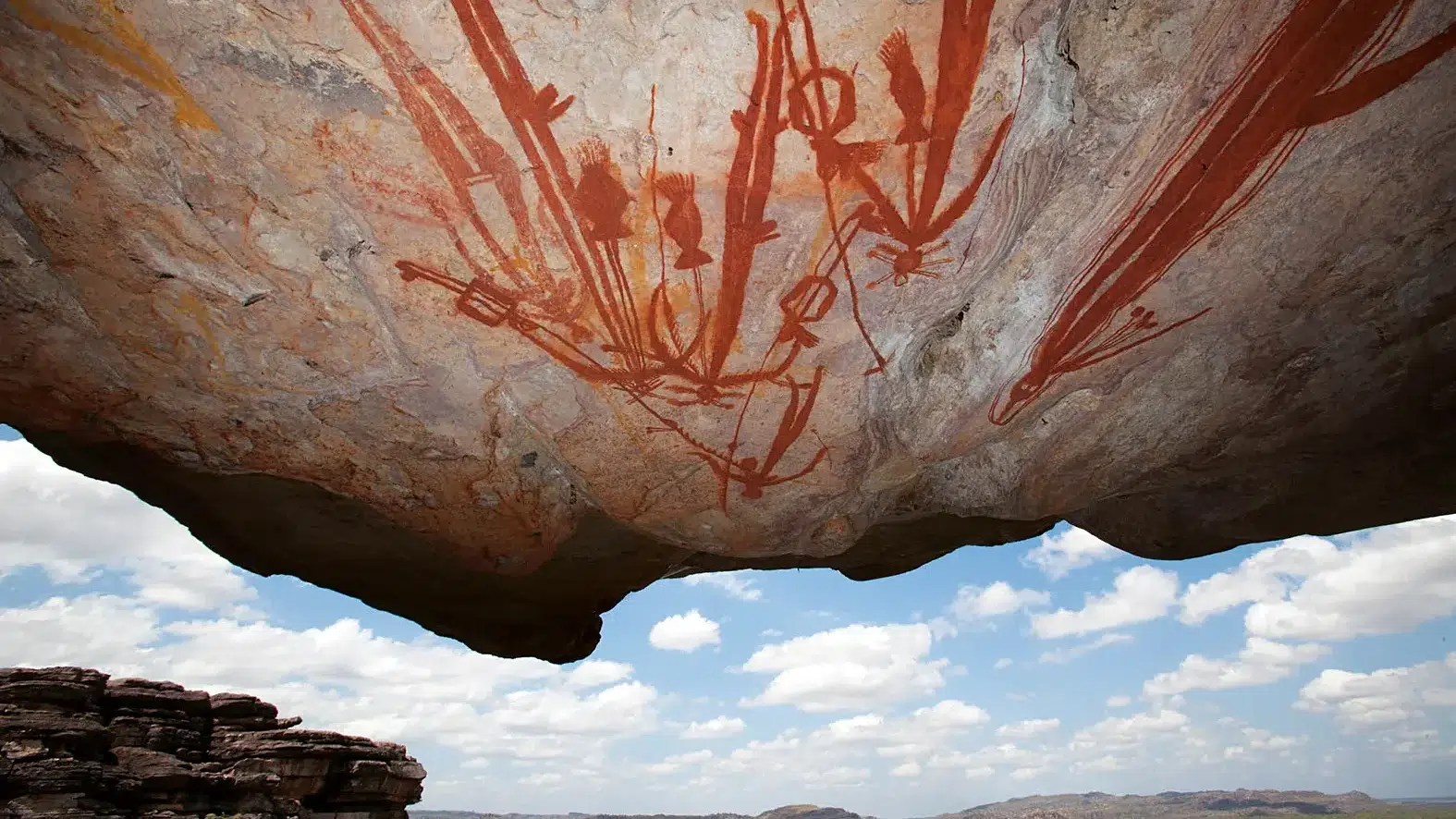 Ancient Aboriginal rock art on a cliff overhang in Arnhem Land