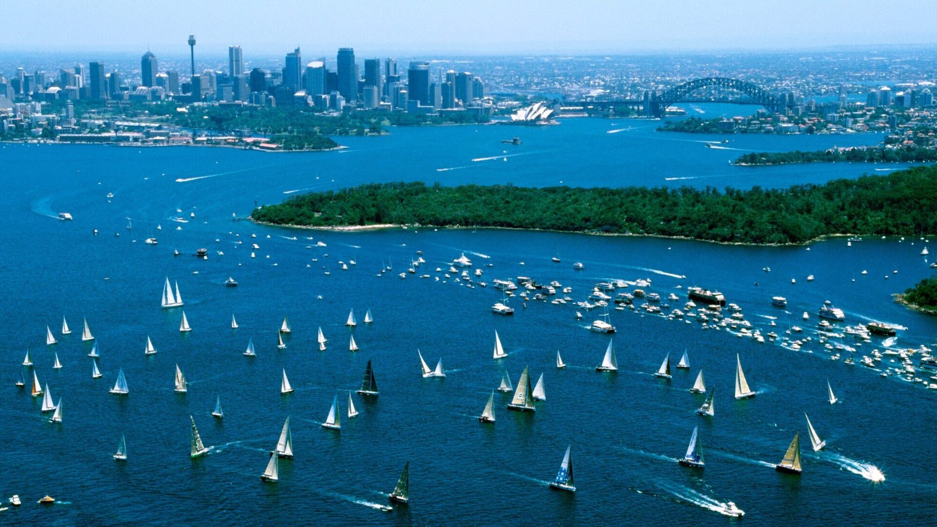Aerial view of the beginning of the Sydney to HObart Yacht Race as the boats leave Sydney Harbour